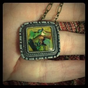 A close up of the necklace in a bundle